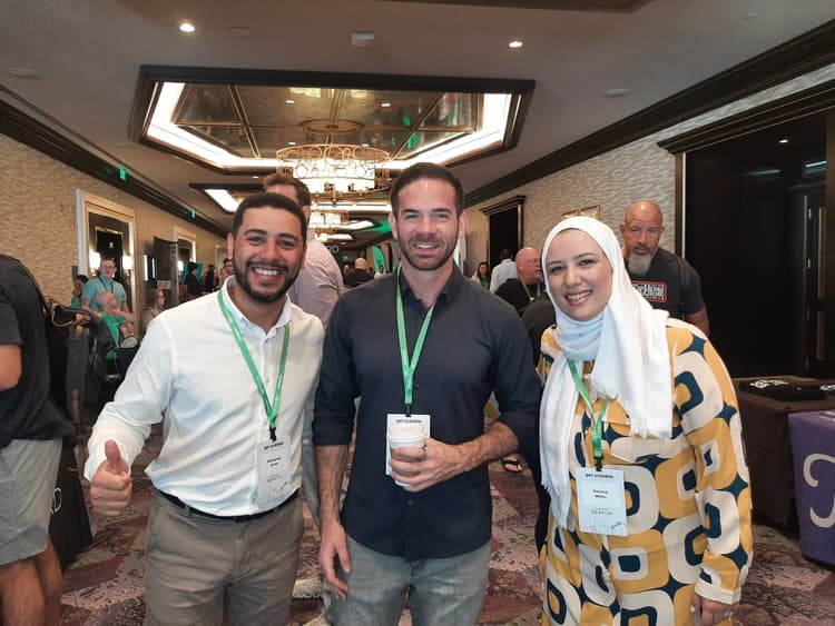 Mohamed Amer and Helaine Mello with Ryan Daniel Moran