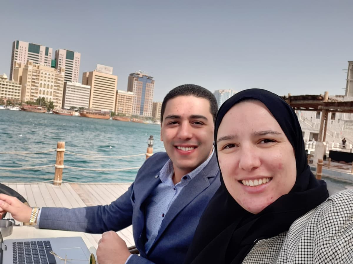 Mohamed Amer and Helaine Mello working together