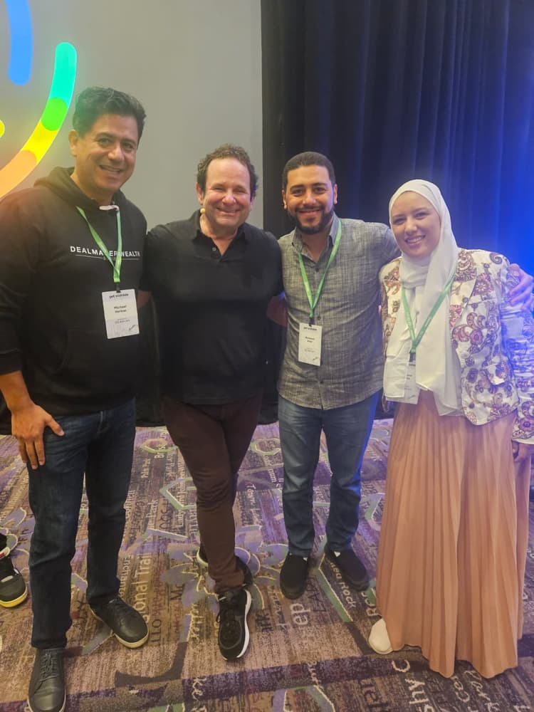 Mohamed Amer and Helaine Mello with Roland Frasier